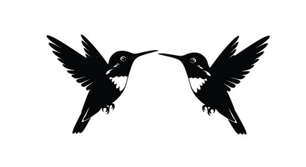 Obraz premium two hummingbirds facing each other silhouette hummingbird