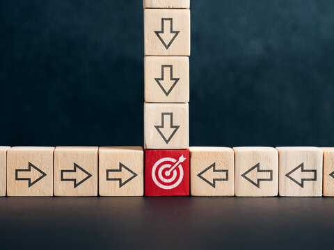 Wooden blocks aligning with red target strategy