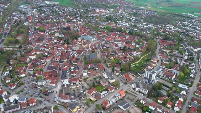 Aerial view around the old town of the city Korbach, in Germany on a sunny spring noon.