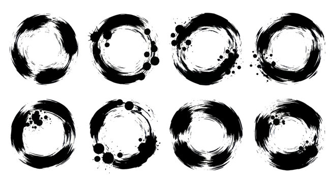 Set of eight black ink brush stroke circles with splatters.