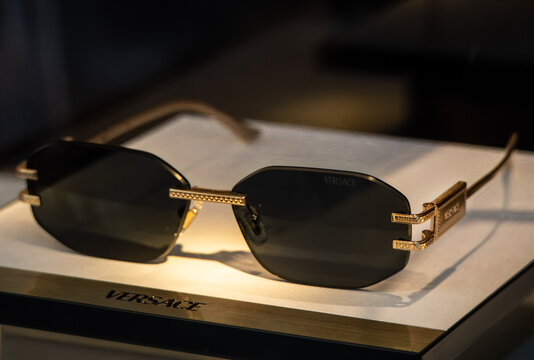 Versace women&rsquo;s rimless sunglasses with gold-tone arms featuring the classic logo. Milan, Italy, 1 June 2026