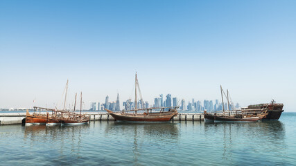Obraz premium Traditional Arab Dhows Docked in Doha Bay, Qatar