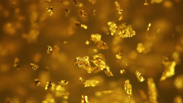 Luxury transparent cream gel with sparkling 24k gold floating particles serum, beauty products, wellness ads cosmetic Skin care, face creme, mask, body lotion, moisturizer, fluid. Abstract background.