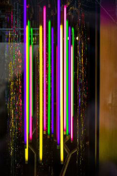 Colourful Retro Neons Light Sticks in Window