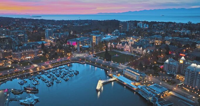 Aerial view of BC Legislative Parliament Building near harbor at night in Victoria, British Columbia, Canada	
