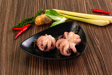 Gourmet Boiled octopus in the bowl © Andrei Starostin