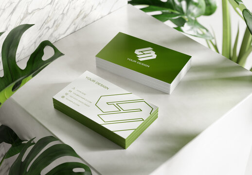 Two Editable Business Card Stacks Mockup In A White Interior
