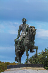 Obraz premium On the streets in Spain in public places. Bronze metal sculptures and statues, decoration of urban architecture.