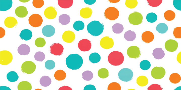 Colorful polka dot pattern with hand drawn circles in bright rainbow colors