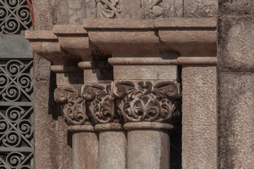 elements of architectural decorations of buildings, columns, pommel and patterns, on the streets in Barcelona, public places. © Kozlik_mozlik