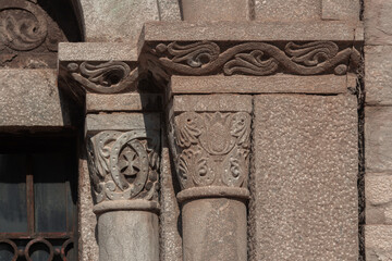 elements of architectural decorations of buildings, columns, pommel and patterns, on the streets in Barcelona, public places. © Kozlik_mozlik