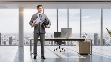 Fototapeta premium Confident Businessman with Blueprints in Modern Office with City View