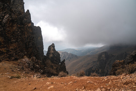 Dramatic rocky landscape at Popocat&eacute;petl Mexico with cloudy sky ideal for hiking and adventure travel during a misty day
