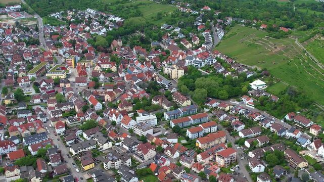 Aerial view around the old town of the city Asperg, in Germany on a sunny spring noon.