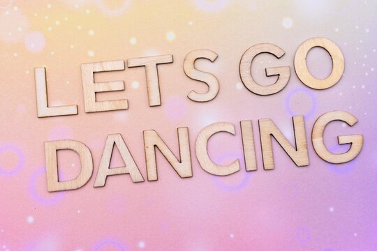 lets go dancing write on abstract backgorund 
