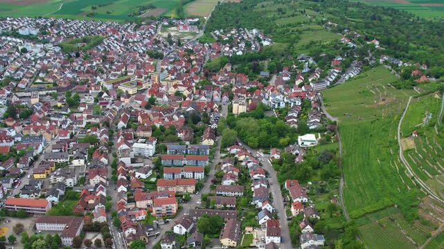 Aerial view around the old town of the city Asperg, in Germany on a sunny spring noon.