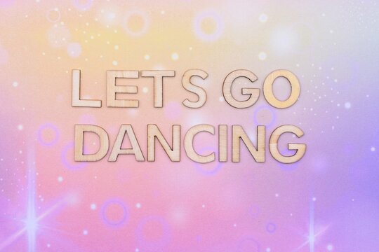 lets go dancing write on abstract background 