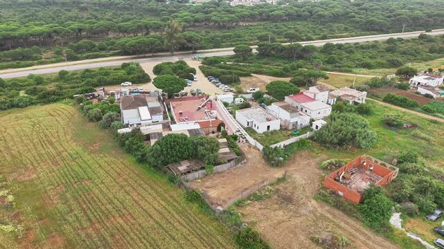 Countryside village landscape with agriculture fields and forest in Cazorla, aerial