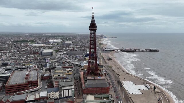Blackpool Tower and beach Panning drone aerial