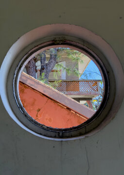 Abandoned Grand Hotel circular window, Bazaruto archipelago, Santa Carolina island, Mozambique