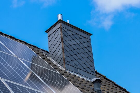 Solar panels generating clean energy on residential roof