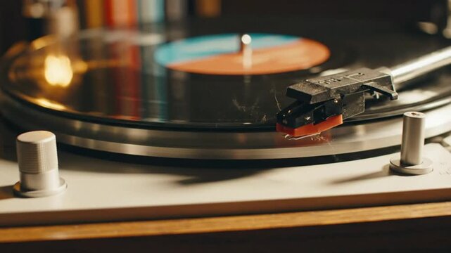 Close up view of vinyl record playing on a vintage turntable with dust on the record's surface