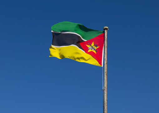 National flag against blue sky, Inhambane Province, Zavala, Mozambique