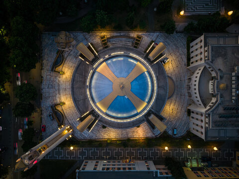 Aerial view of the illuminated dome of the Orthodox Cathedral of Resurrection with its distinctive cross pattern at night in Tirane, Qarku i Tiranes, Albania.