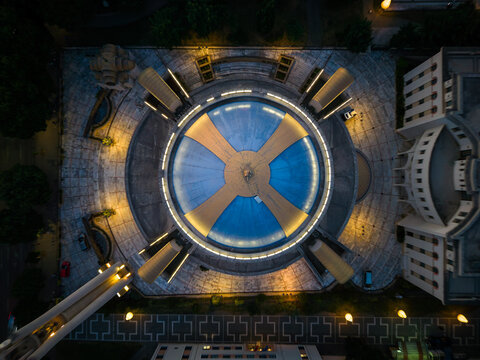 Aerial view of the illuminated dome of the Orthodox Cathedral of Resurrection with its distinctive cross pattern at night in Tirane, Qarku i Tiranes, Albania.