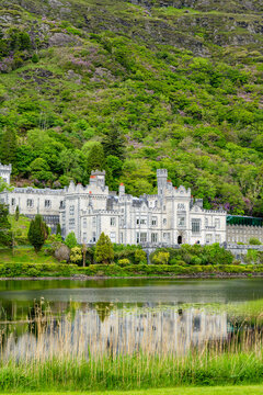 Kylemore Abbey stands on Pollacappul Lough below Druchruach Mountain in Connemara, County Galway. A famous neo Gothic landmark in western Ireland.