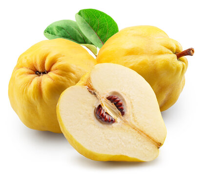Quinces with green leaves and cross section of quince on white background. File contains clipping path.