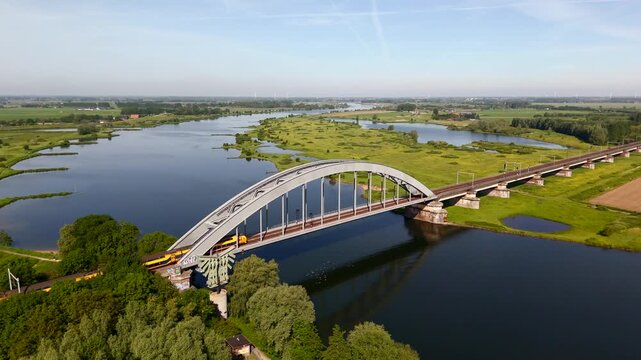 Dutch train crossing a bridge