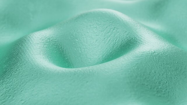 Mint green textured fluid surface forming soft, organic ripples, creating an abstract background with natural, flowing curves and a gentle, smooth appearance