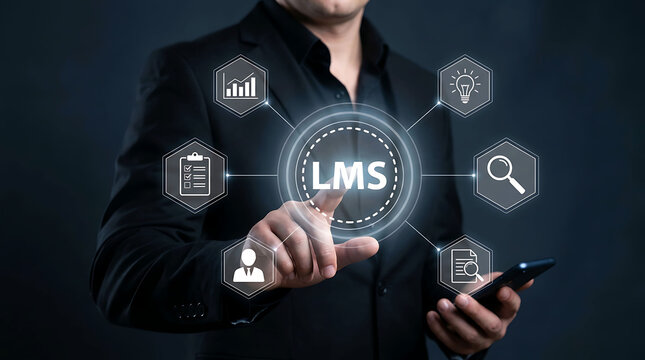 Businessman pointing at virtual LMS acronym icon while holding smartphone