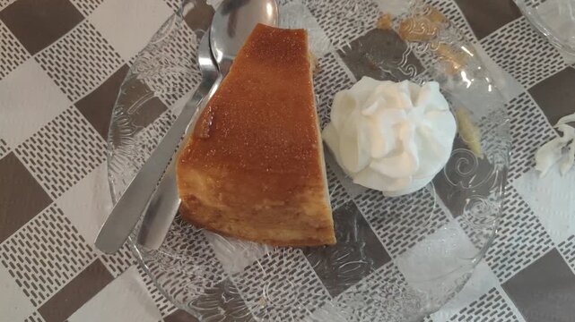 Delicious cr&egrave;me caramel dessert with whipped cream
