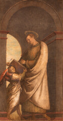 Obraz premium VERCELLI, ITALY - JANUARY 16, 2026 - The painting of St Matthew the evangelist in the church Chiesa di San Cristoforo by unkonwn artist. 