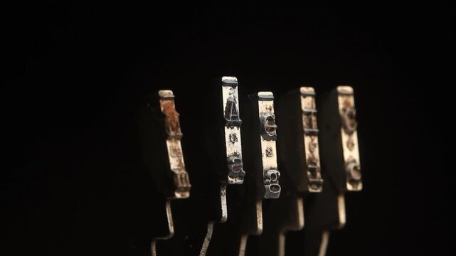 The word Magic with retro typewriter hammers 