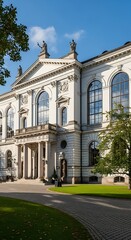 Fototapeta premium Elegant Historic Museum Building with Arched Windows in Sunny Courtyard