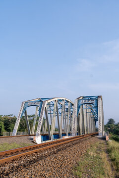 The historical Renville twin railway steel truss bridge over the double tracks in Kebumen, Central Java, Indonesia.