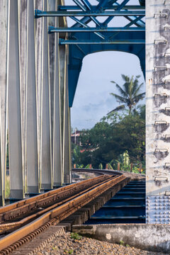 The historical Renville twin railway steel truss bridge over the double tracks in Kebumen, Central Java, Indonesia.