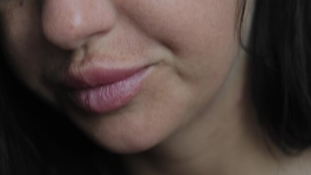 Extreme close up of nail biting behavior, anxiety, stress and compulsive nervous habit concept