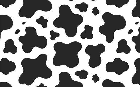 Minimalist seamless cow print pattern with organic black spots on a white background creates a clean and rustic aesthetic.