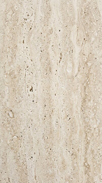 Natural beige travertine stone texture background with porous details