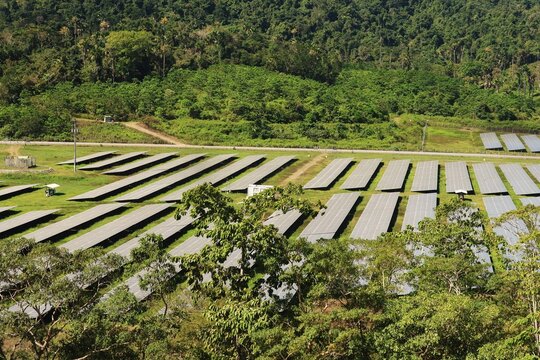Large-scale ground-mounted solar power plants (PLTS). These clean energy infrastructure facilities combine thousands of photovoltaic panels to capture solar radiation and convert it into electrical.