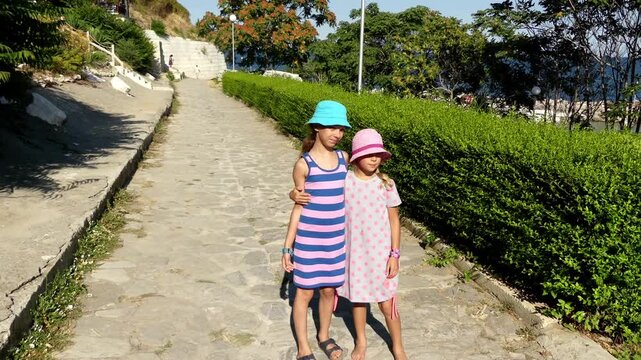 Two little beautiful girls in Nesebar, Bulgaria