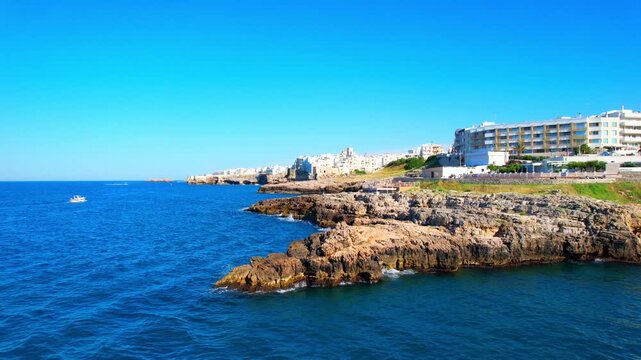 Polignano a Mare - Italy, Apulia - rising aerial view of the bathing bay