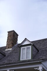Obraz premium old house roof with chimney
