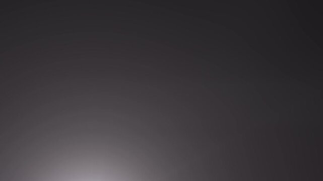 Cinematic light leak transition overlay with moving bokeh and glowing lens flare streaks