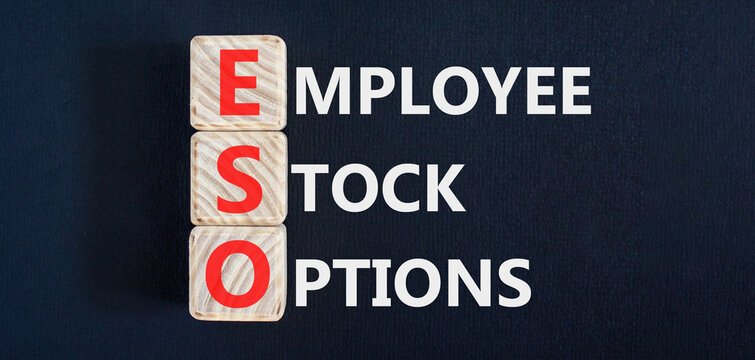 ESO employee stock options symbol. Concept words ESO employee stock options on beautiful wooden blocks. Beautiful black background. Business ESO employee stock options concept. Copy space.