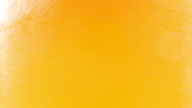 Beer in a glass. The drink is poured into the glass.
